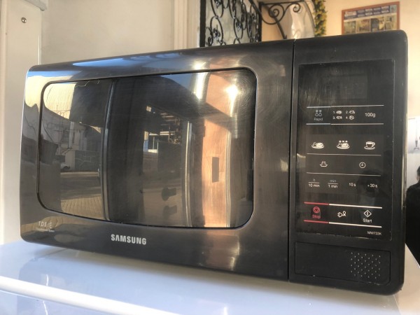 Használt Samsung MW733K-B mikrohullámú sütő [H10483] 